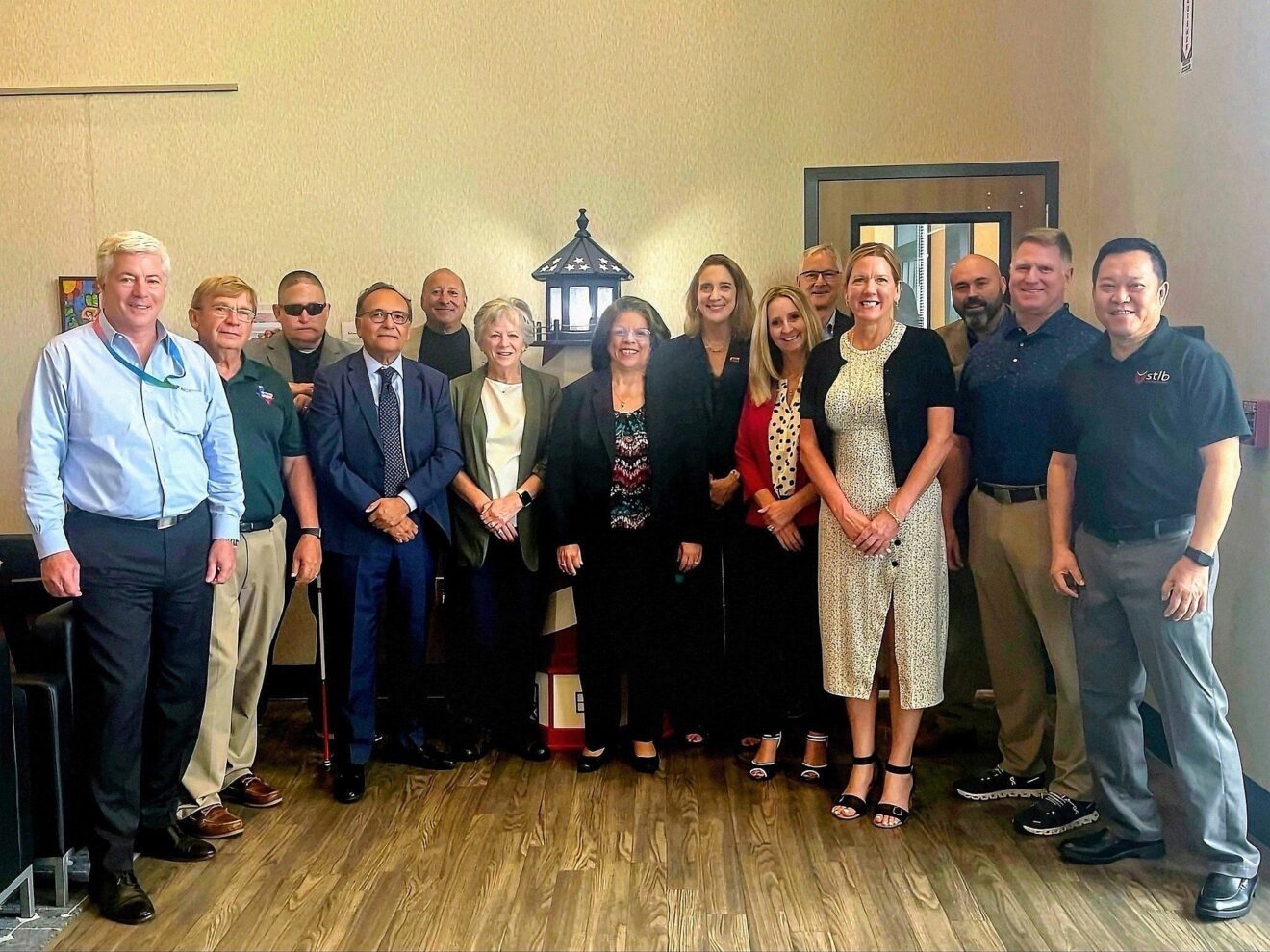 Group photo of NIB and Texas Lighthouse representatives