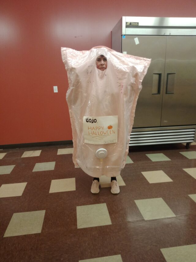 Maria as a bag of GOJO pink soap.