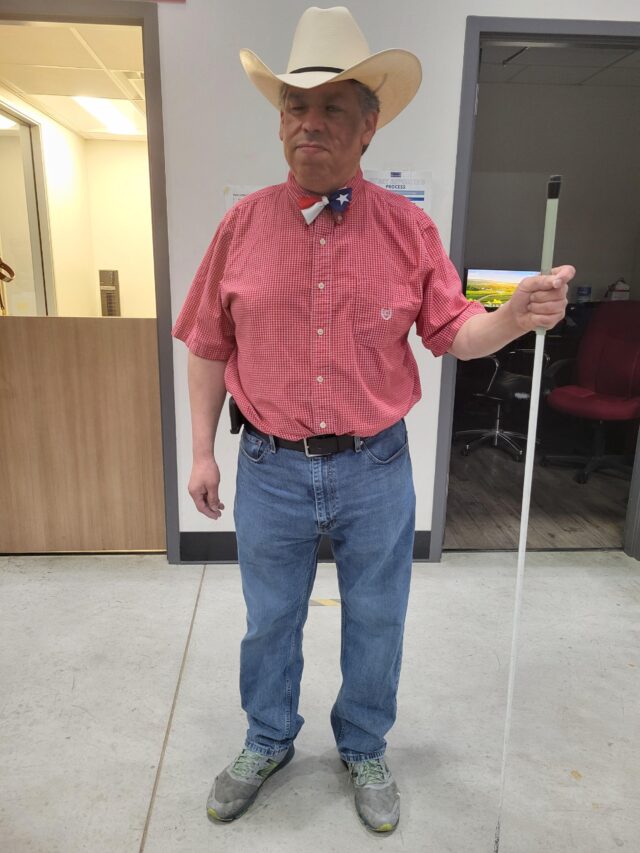 Photo of Ernesto in western wear.